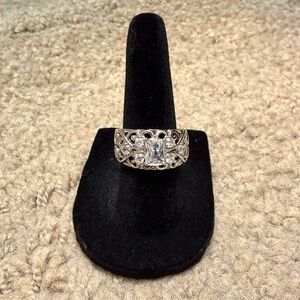 Elegant Sterling Silver Women's Ring with Intricate Design.